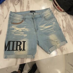 AMIRI Light Blue Distressed Denim Shorts